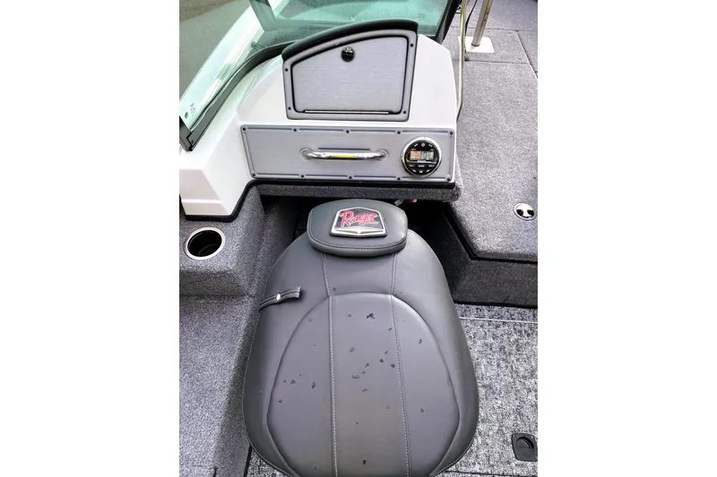 Slide: The Image of 2024 Ranger VS1882 WT boat interior with gray seat and dashboard. - 3