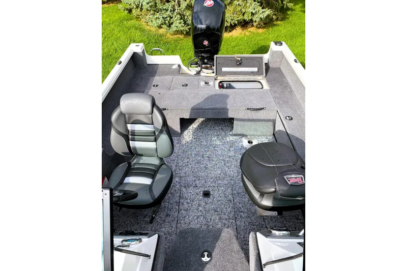 Slide: The Image of 2024 Ranger VS1882 WT boat interior with seating and storage compartments. - 5