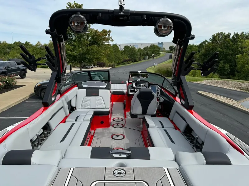 Slide: The Image of 2022 MasterCraft X24 boat interior with spacious seating and modern design. - 15