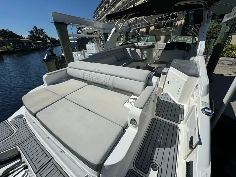 Slide: The Image of 2020 Sea Ray SDX 290 Outboard boat with spacious seating and sleek design. - 10