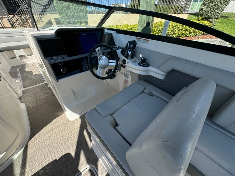 Slide: The Image of 2020 Sea Ray SDX 290 Outboard boat interior with modern helm and seating. - 20