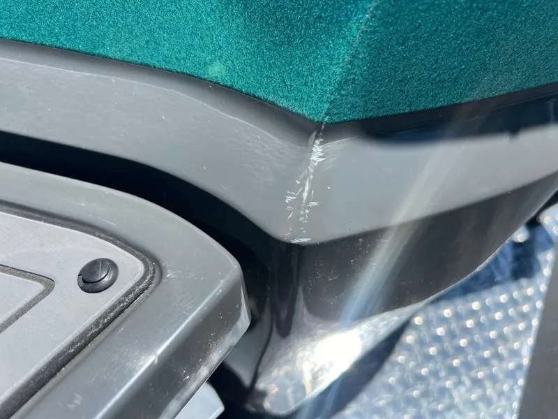 Slide: The Image of Close-up of a 2017 MasterCraft XT21 boat seat with visible scratch. - 5