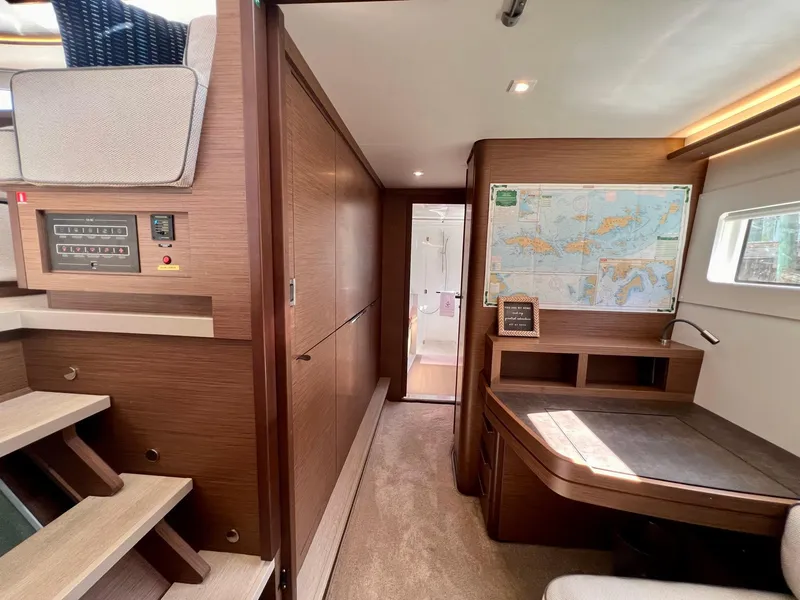 Slide: The Image of Interior of 2022 Lagoon 46 yacht with navigation desk and map. - 22