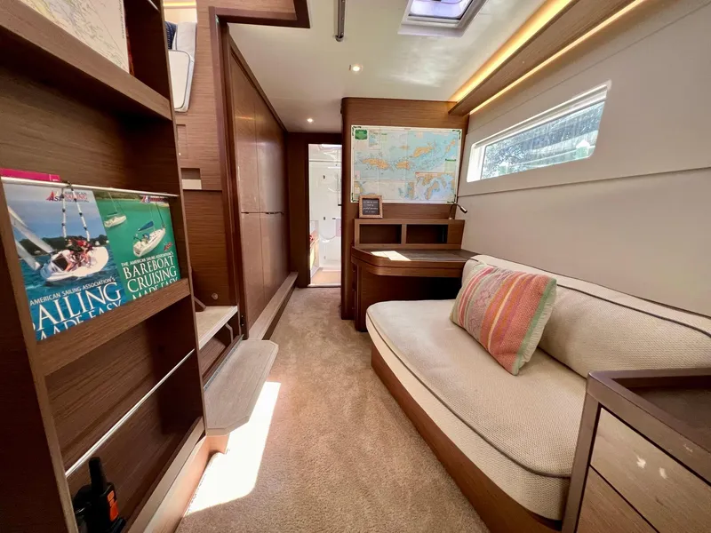 Slide: The Image of Luxurious interior of 2022 Lagoon 46 yacht with cozy seating and nautical decor. - 25