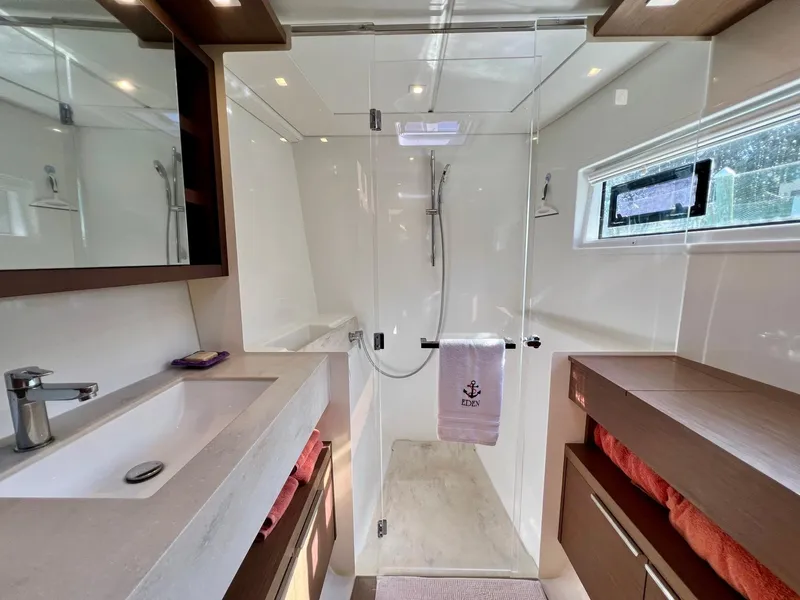 Slide: The Image of Luxurious bathroom in 2022 Lagoon 46 yacht with modern fixtures and spacious shower. - 26
