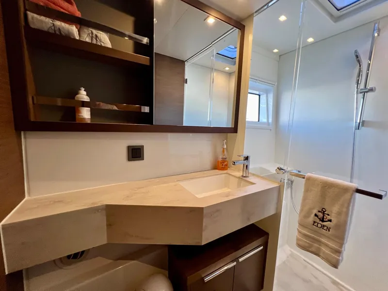 Slide: The Image of Luxurious bathroom in 2022 Lagoon 46 yacht with modern fixtures and elegant design. - 31