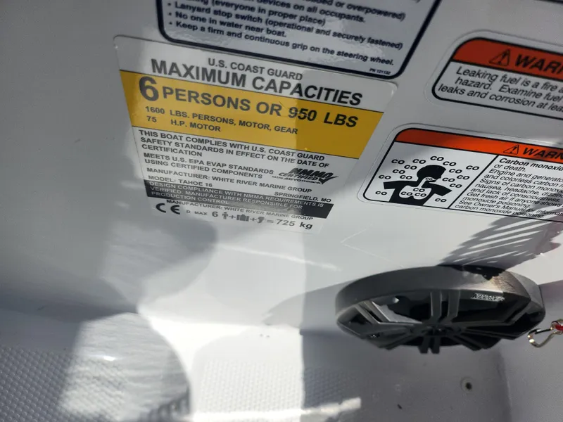 Slide: The Image of 2021 Tahoe T16 capacity label: 6 persons or 950 lbs, U.S. Coast Guard compliant. - 12