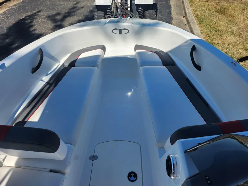 Slide: The Image of 2021 Tahoe T16 boat interior with seating and storage compartments. - 13