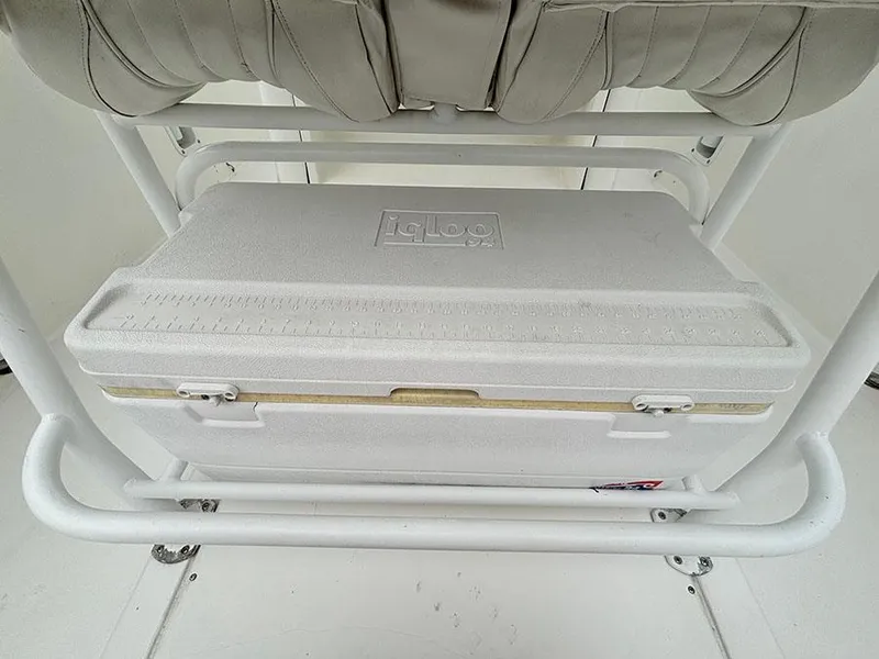 Slide: The Image of White Igloo cooler on Marlago FS35 boat, 2003 model, under cushioned seat. - 15