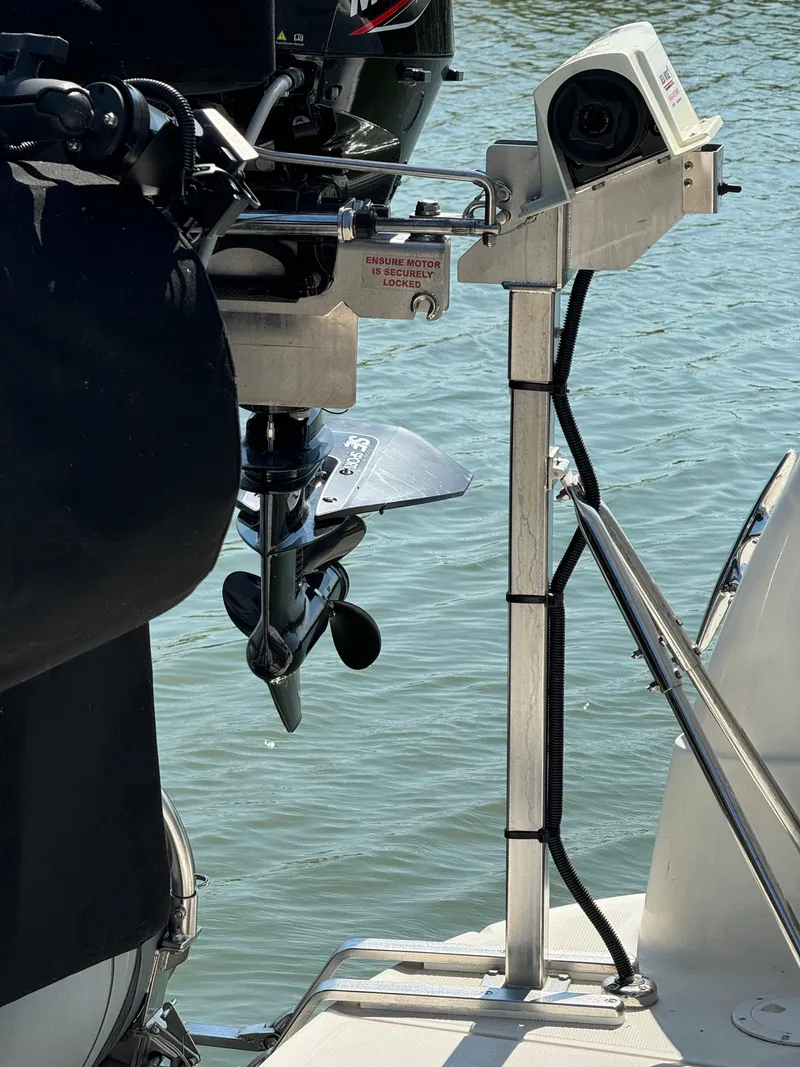 Slide: The Image of 2005 Sea Ray 390 Motor Yacht engine mount detail by the water. - 11