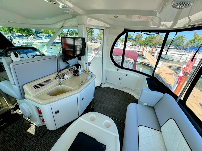 Slide: The Image of Interior of 2005 Sea Ray 390 Motor Yacht with seating and kitchenette. - 15