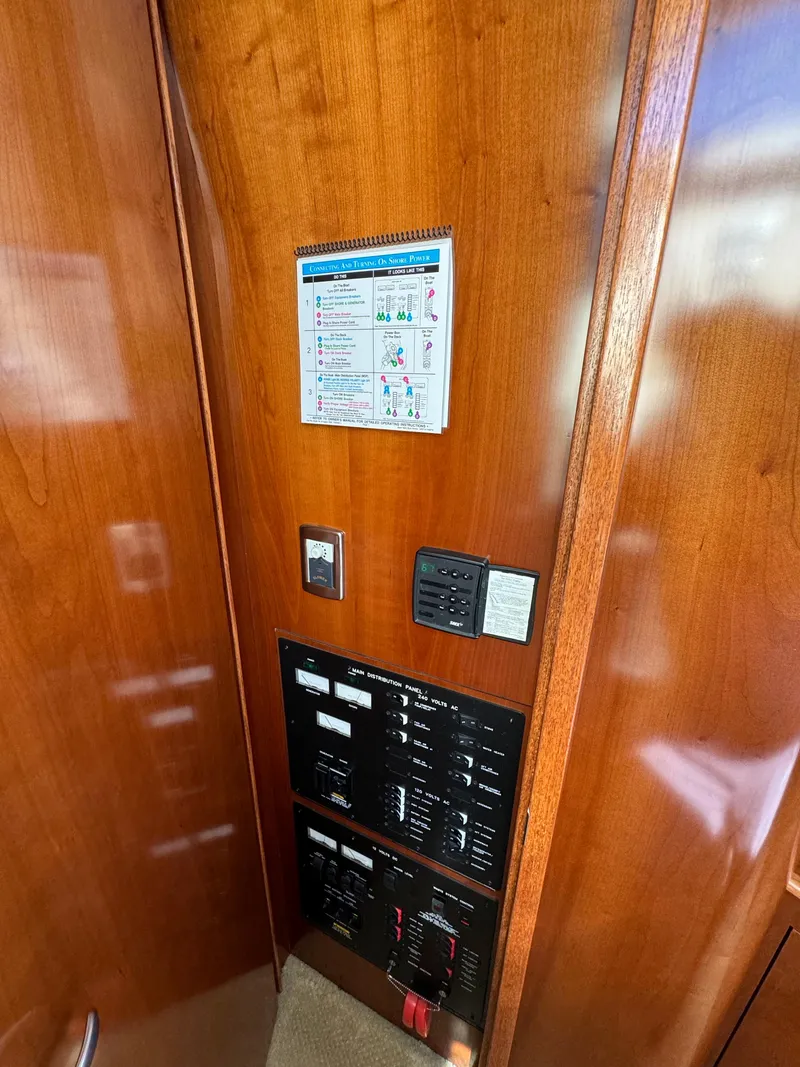 Slide: The Image of Control panel inside 2005 Sea Ray 390 Motor Yacht with wood finish. - 37
