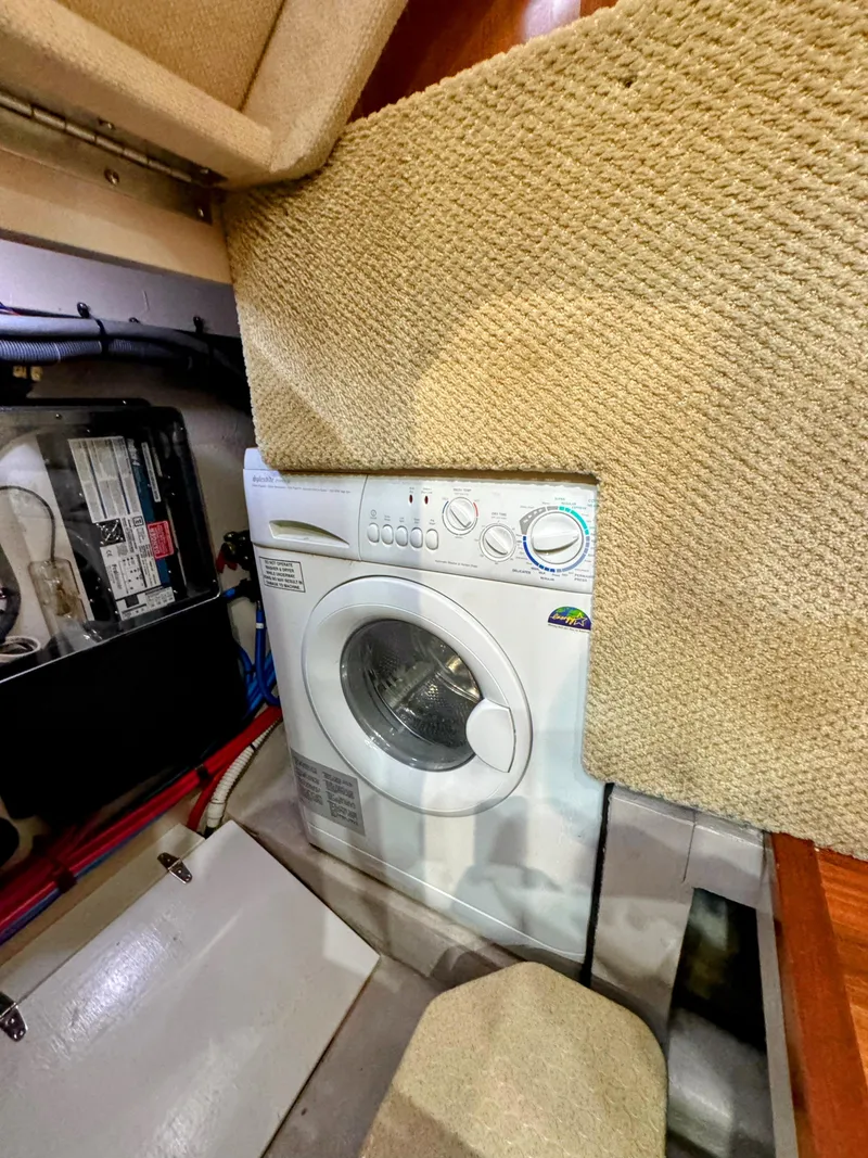 Slide: The Image of Washing machine in 2005 Sea Ray 390 Motor Yacht interior. - 46