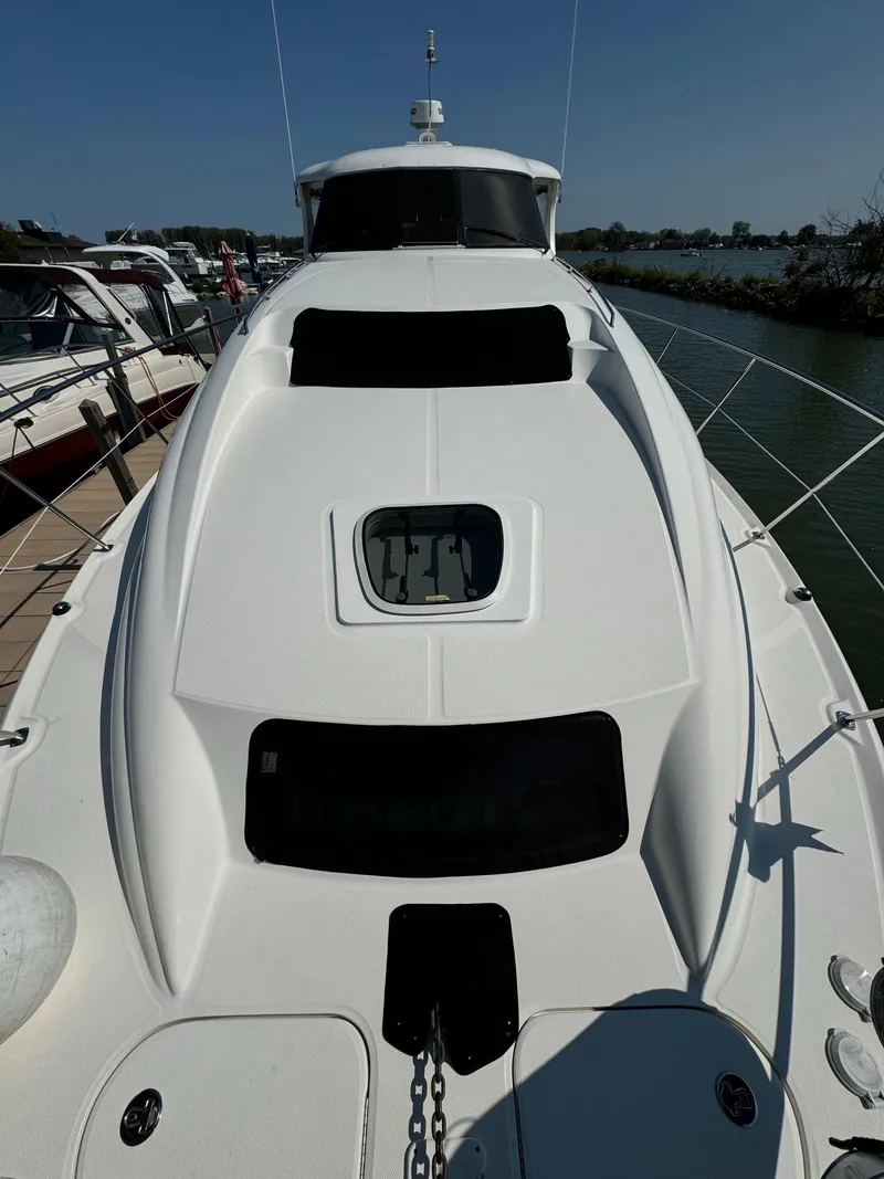 Slide: The Image of 2005 Sea Ray 390 Motor Yacht docked at marina, top deck view. - 6