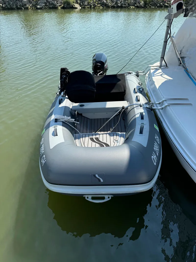 Slide: The Image of Inflatable boat docked beside 2005 Sea Ray 390 Motor Yacht. - 9