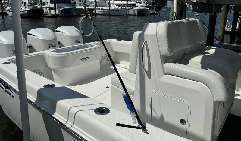 Slide: The Image of 2019 Invincible 36 Open Fisherman boat with triple engines docked at marina. - 11