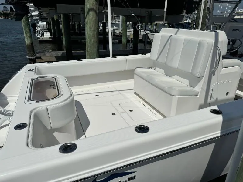 Slide: The Image of 2019 Invincible 36 Open Fisherman boat with white seating and spacious deck. - 12