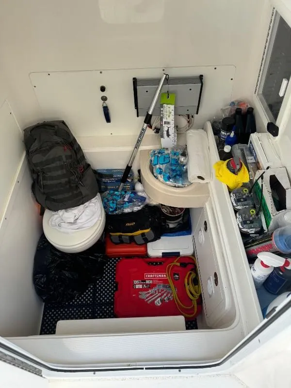 Slide: The Image of 2019 Invincible 36 Open Fisherman cabin with fishing gear and supplies. - 19