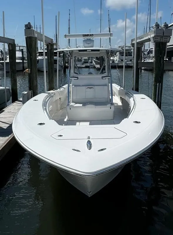 Slide: The Image of 2019 Invincible 36 Open Fisherman boat docked in marina. - 3