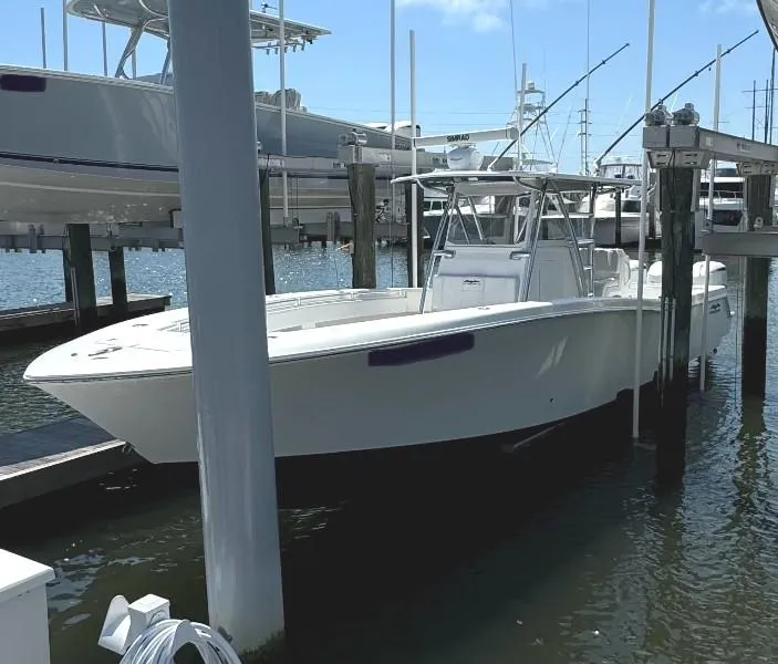 Slide: The Image of 2019 Invincible 36 Open Fisherman boat docked at marina. - 5