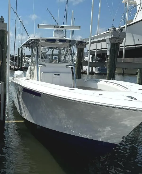 Slide: The Image of 2019 Invincible 36 Open Fisherman boat docked in marina. - 7