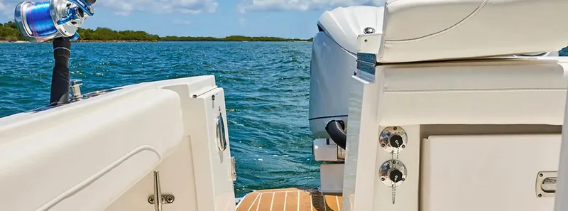 Slide: The Image of 2026 Regulator 23 boat on water, featuring sleek design and powerful engine. - 4