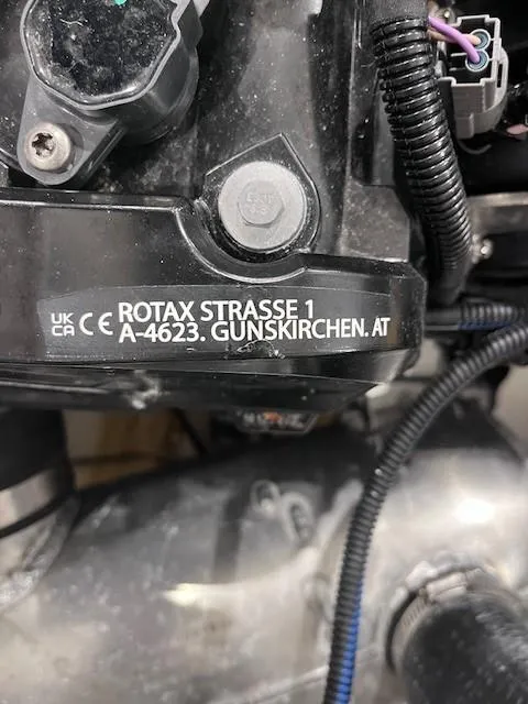 Slide: The Image of Close-up of AB Inflatables ABJET 350XP 2023 engine component with Rotax branding. - 10