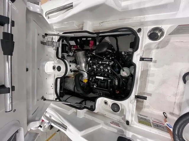 Slide: The Image of 2023 AB Inflatables ABJET 350XP engine compartment, showcasing internal components and layout. - 9