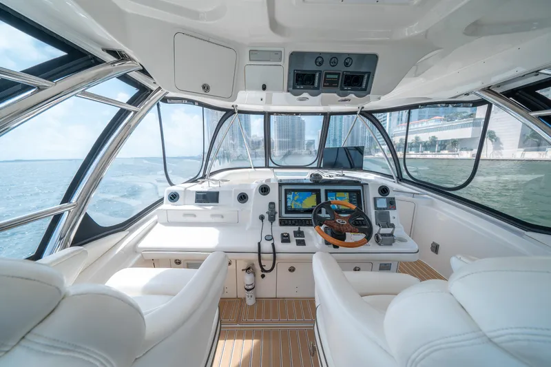 Slide: The Image of Luxurious 2006 Sea Ray 58 Sedan Bridge yacht cockpit with modern navigation system. - 36
