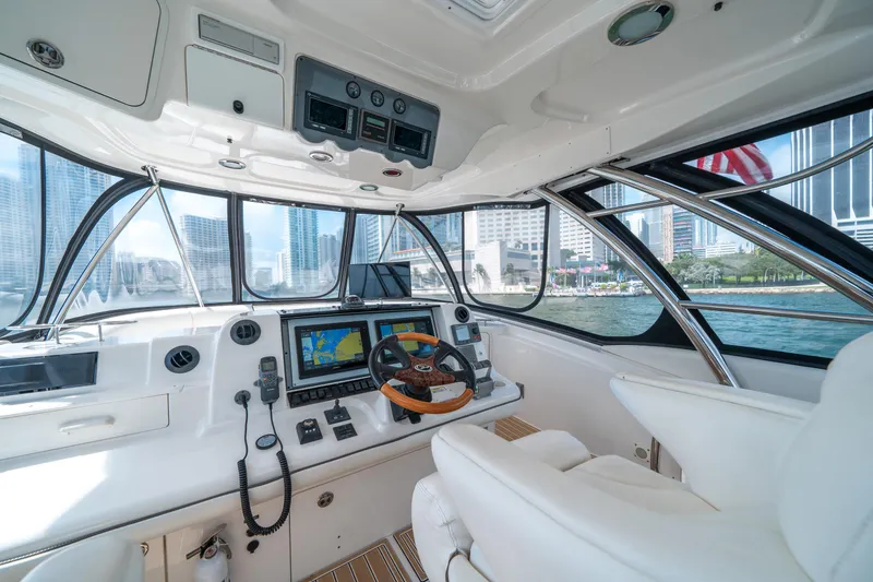 Slide: The Image of Interior of 2006 Sea Ray 58 Sedan Bridge yacht with modern navigation equipment. - 37