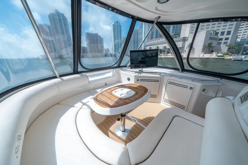 Slide: The Image of Luxurious interior of 2006 Sea Ray 58 Sedan Bridge yacht with city skyline view. - 40