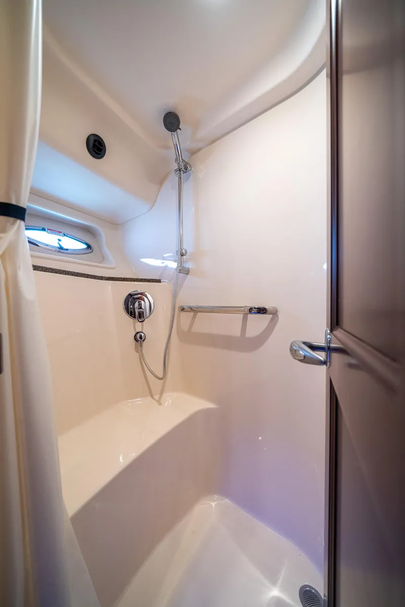 Slide: The Image of 2006 Sea Ray 58 Sedan Bridge shower with modern fixtures and sleek design. - 46