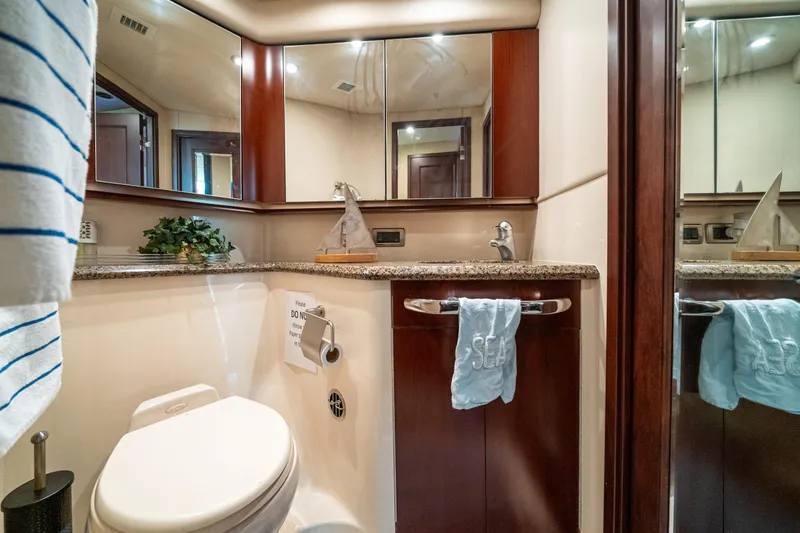 Slide: The Image of Luxurious bathroom in 2006 Sea Ray 58 Sedan Bridge yacht with elegant fixtures. - 49