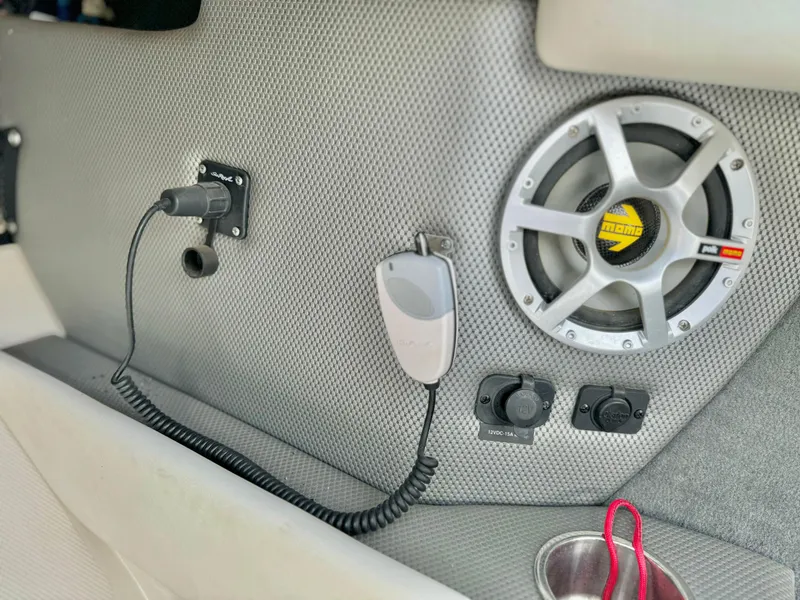 Slide: The Image of Interior of 2008 Sea Ray 230 Select Fission with speaker and controls. - 12