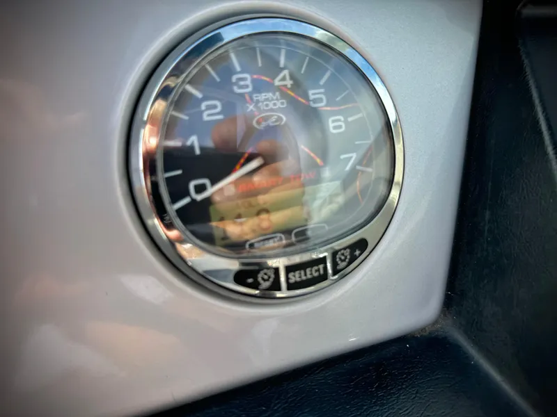 Slide: The Image of Tachometer of 2008 Sea Ray 230 Select Fission boat, showing RPM gauge. - 15