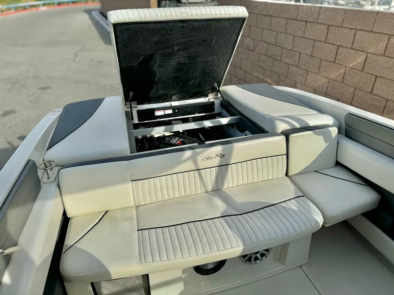 Slide: The Image of 2008 Sea Ray 230 Select Fission boat interior with open engine compartment. - 19