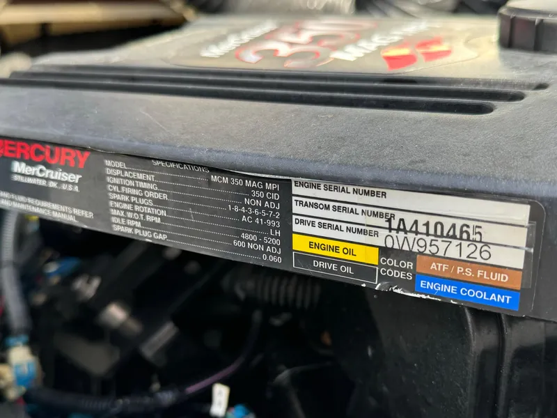 Slide: The Image of Close-up of a 2008 Sea Ray 230 Select Fission engine label. - 20