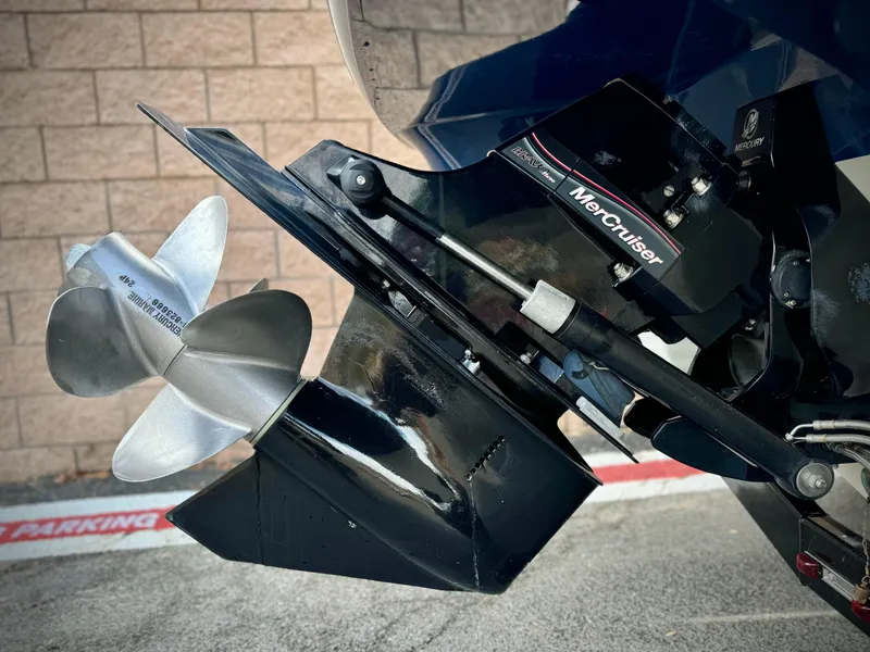 Slide: The Image of 2008 Sea Ray 230 Select Fission boat with MerCruiser propeller detail. - 6