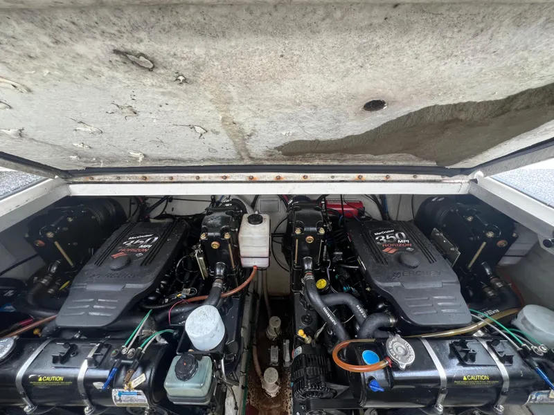 Slide: The Image of Engine compartment of a 2007 Sea Ray 290 Amberjack with twin engines visible. - 33