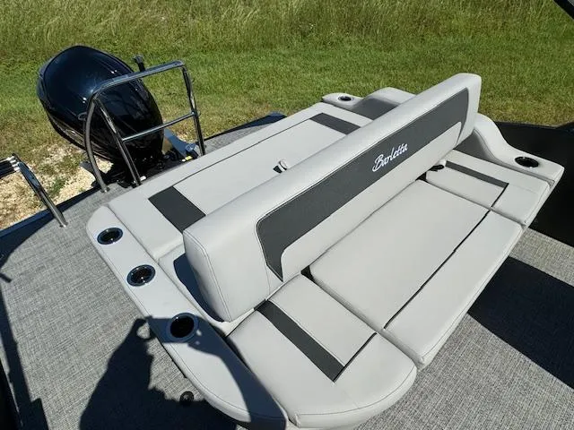 Slide: The Image of 2025 Barletta Aria 24UC boat with sleek seating and modern design. - 19