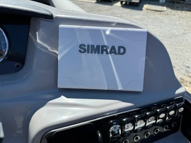 Slide: The Image of Dashboard of 2025 Barletta Aria 24UC with Simrad navigation system. - 20