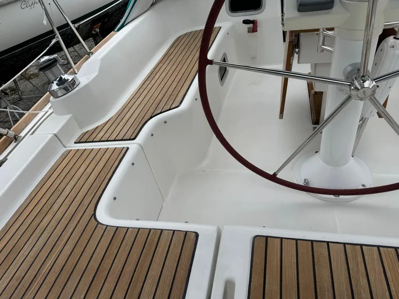 Slide: The Image of Beneteau Oceanis 37 cockpit with teak flooring and steering wheel, 2008 model. - 18