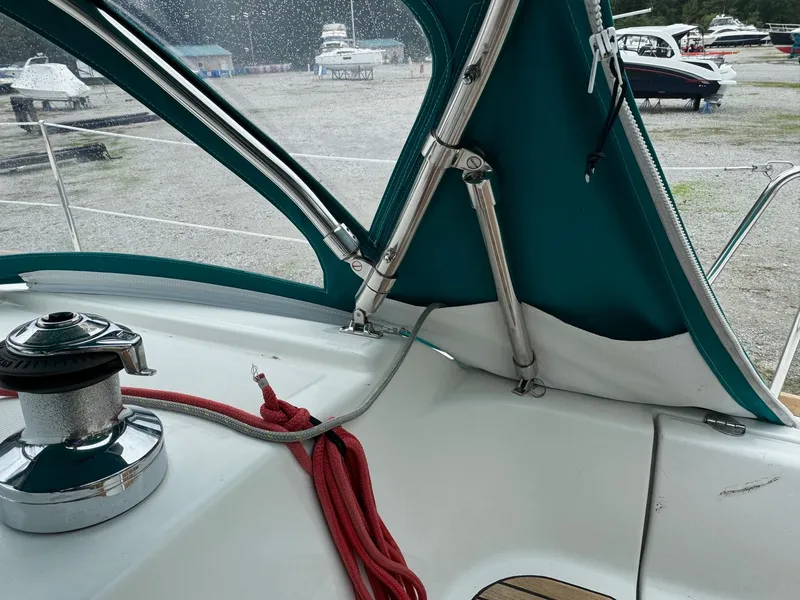 Slide: The Image of Beneteau Oceanis 37 cockpit detail with winch and red rope, 2008 model. - 24