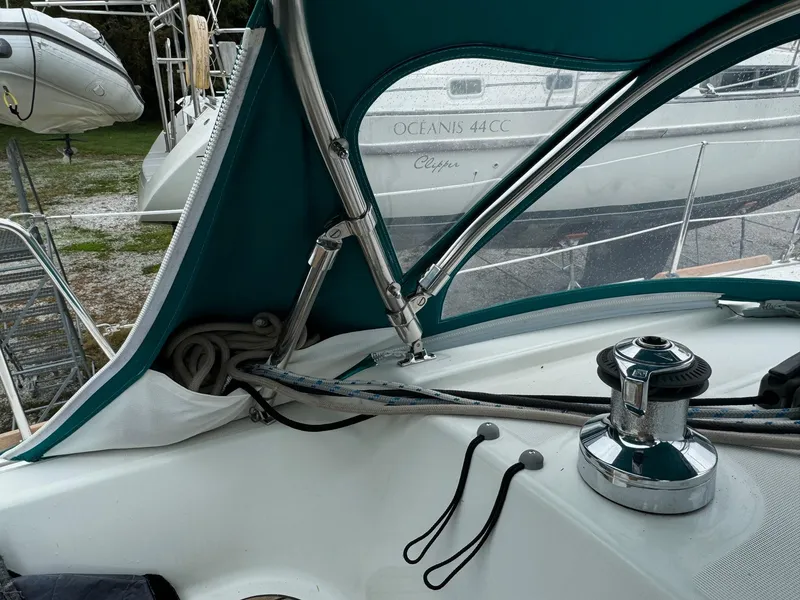 Slide: The Image of 2008 Beneteau Oceanis 37 sailboat cockpit with winch and canopy. - 25