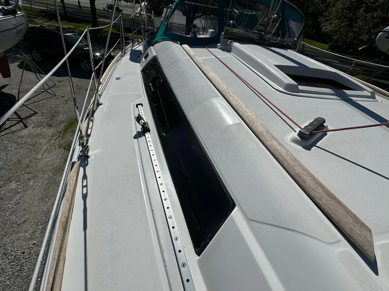 Slide: The Image of 2008 Beneteau Oceanis 37 sailboat deck with sleek design and modern fittings. - 28