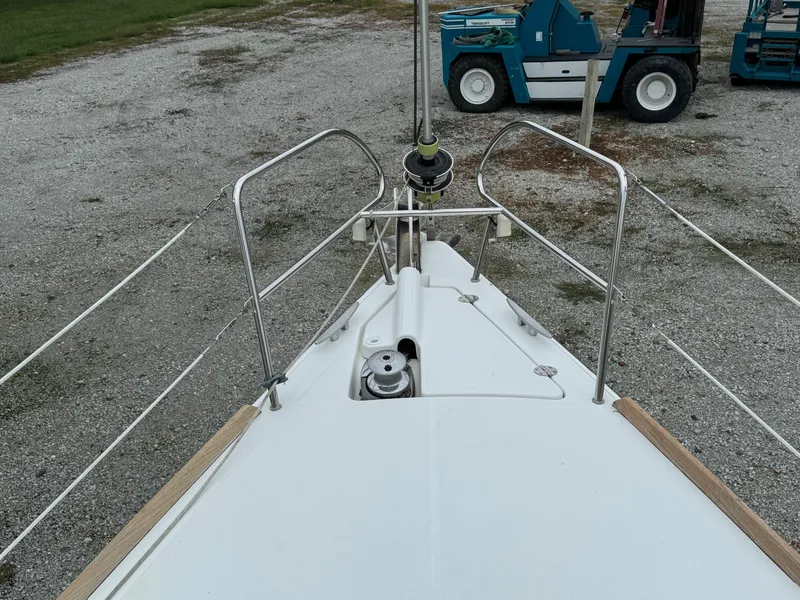 Slide: The Image of Bow view of 2008 Beneteau Oceanis 37 sailboat on gravel lot. - 30