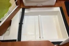 Slide: The Image of Beneteau Oceanis 37 (2008) interior storage compartment with wooden flooring. - 49