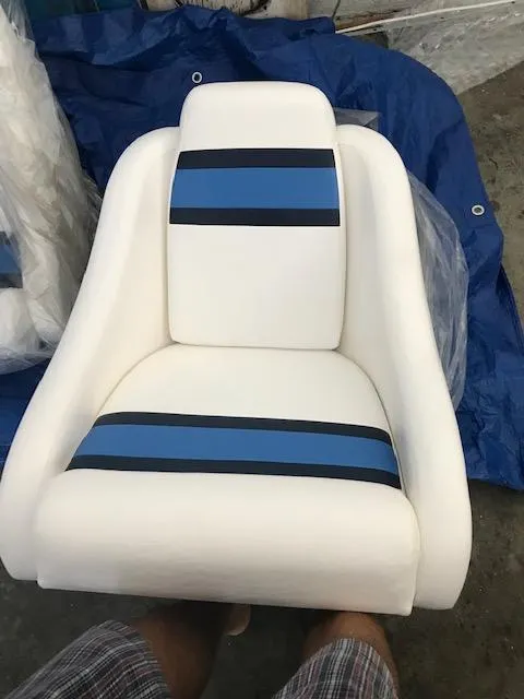 Slide: The Image of 1970 Chris-Craft 25 Lancer boat seat with blue and black stripes. - 10