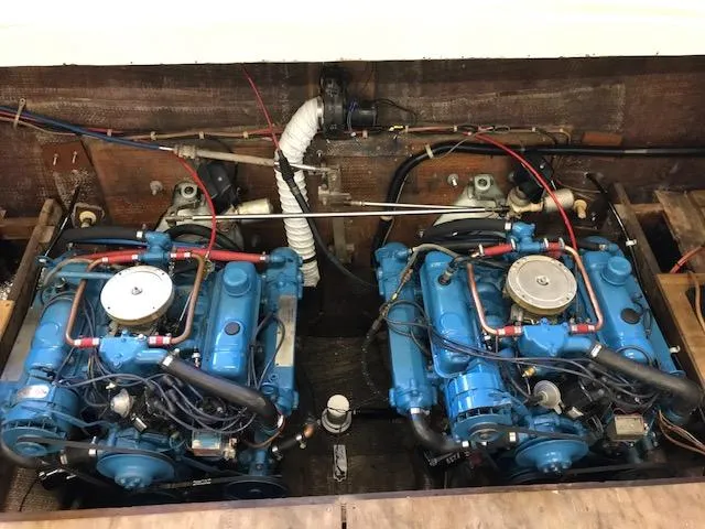 Slide: The Image of Twin blue engines in a 1970 Chris-Craft 25 Lancer boat. - 16