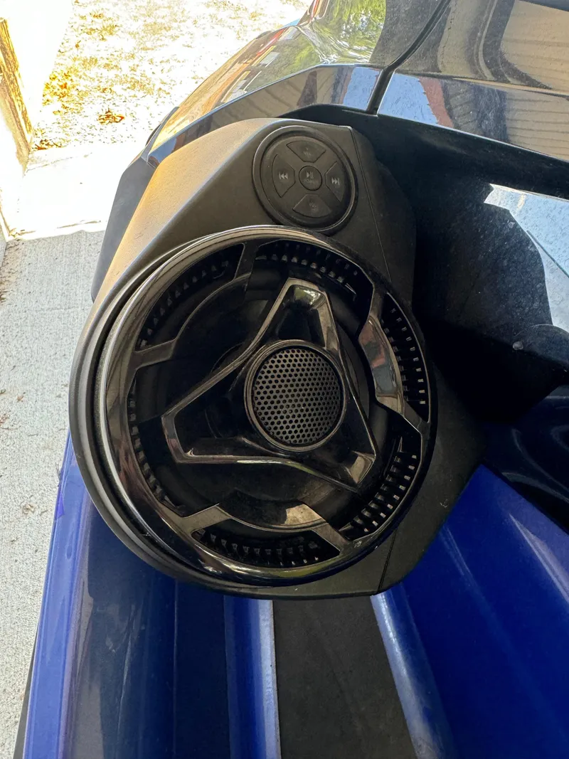 Slide: The Image of 2021 Sea-Doo Wake Pro 230 speaker system with control buttons, close-up view. - 4